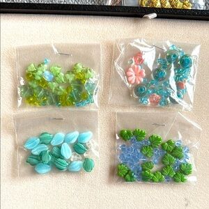 Assorted Glass Bead Collection in Green, Blue, and Pink